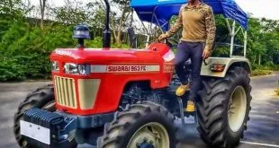 Mahendra Singh Dhoni riding tractor